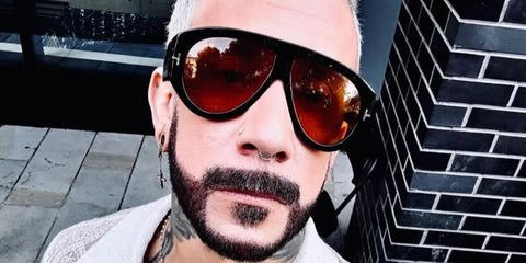Celebrity and singer AJ McLean of Backstreet Boys was seen wearing black Tom Ford Bronson TF1044 01E sunglasses in a social media post.