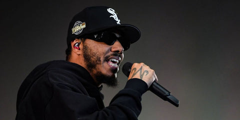 Rapper AJ Tracey was seen wearing black Prada PR 17WS 1AB5S0 Symbole Sunglasses at the KISS Haunted House Party 2022 in London.