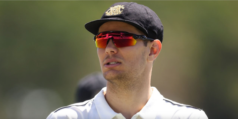 Australian cricketer Aaron Hardie was seen wearing polished black Oakley Radar EV Path OO9211 17 sunglasses with prizm red lenses during the Sheffield Shield match between Western Australia and Victoria, March 2022