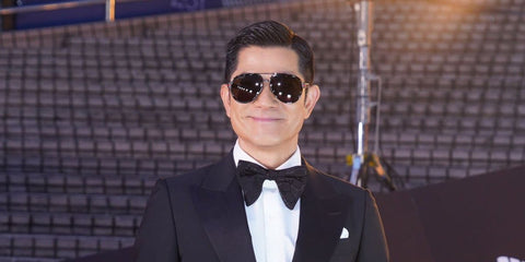 Hong Kong actor Aaron Kwok was seen wearing black and dark ruthenium Gucci GG0447S 001 aviator sunglasses with  Polarised lenses at the 43rd Hong Kong Film Awards, April 2025