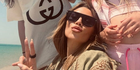 Model Abbey Clancy was seen wearing black Tom Ford Dunning-02 TF907 01V sunglasses during her family trip to Qatar in May 2025