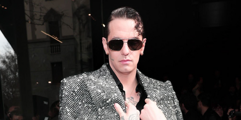 Italian singer Achille Lauro was seen wearing silver and black Dolce&Gabbana DG2328 1324/87 sunglasses at the Dolce & Gabbana Fall/Winter 2026 fashion show during Milan Fashion Week.