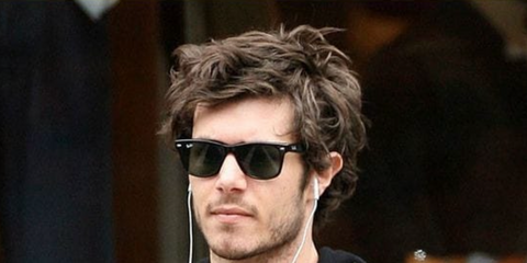 Adam Brody is seen wearing the classic icon Ray-Ban Wayfarer 2140 901 Black sunglasses