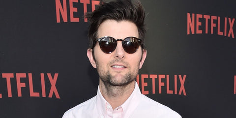 Severance actor Adam Scott was seen wearing black Ray-Ban RB 2180 601/71 round sunglasses