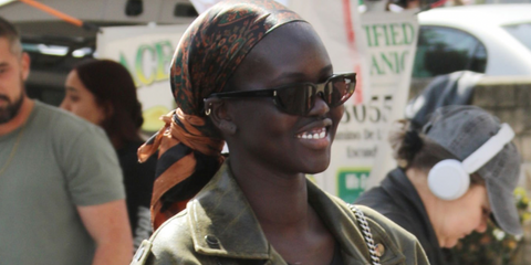 Model Adut Akech was seen wearing black Saint Laurent Sun SL 634 Nova 001 sunglasses in Los Angeles, March 2025. Shop online now on Pretavoir