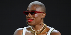 Actress Aisha Hinds was seen wearing red Gucci GG1779S 003 sunglasses onstage during the 2025 ESSENCE Festival Of Culture in New Orleans. Shop online now on Pretavoir