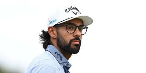 Professional golfer Akshay Bhatia was seen wearing rubber black Ray-Ban RB 7046 5364 optical glasses at The 152nd Open championship in Troon, Scotland, July 2024. Shop online now on Pretavoir