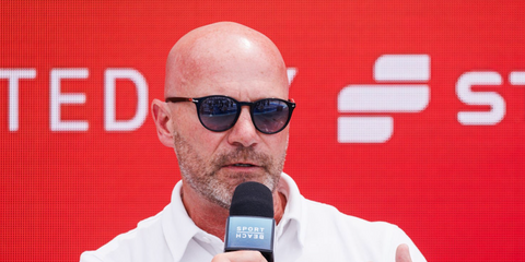 Football legend Alan Shearer was seen wearing black Persol 3152S 9014/Q8 round sunglasses with blue gradient lenses on stage during "1 on 1 with Alan Shearer" panel during Cannes Lions, June 2023. Shop online now on Pretavoir