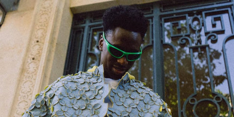 Belgian footballer Albert Sambi Lokonga was seen wearing green Bottega Veneta BV1184S 003 sunglasses during Paris Men's Fashion Week season Spring/Summer 2024