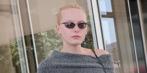 Alex Consani was seen wearing black Prada PR B50S 1AB3C2 sunglasses during Cannes Film Festival 2025. Shop online now on Pretavoir