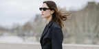 Alexa Chung was seen wearing black Prada PR 26ZS 16K08Z round cat eye sunglasses during Paris Fashion Week Fall/Winter 2024 season