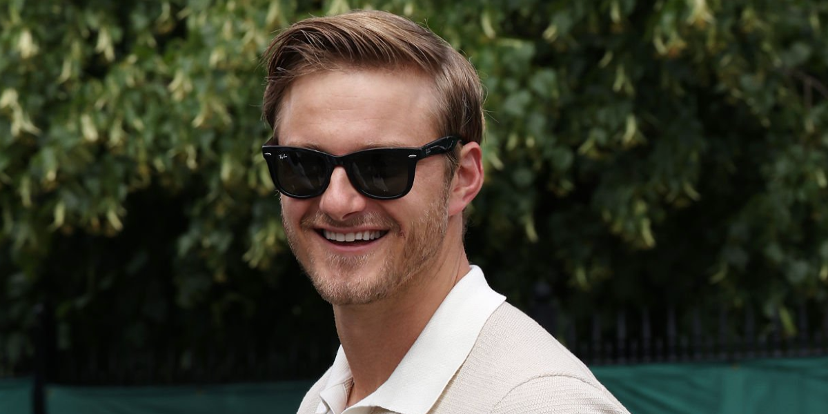 Alexander Ludwig was seen wearing the iconic Ray-Ban Wayfarer 2140 901 Black sunglasses at the Wimbledon Tennis Championships 2026.