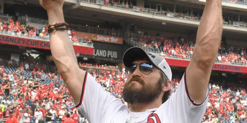 Russian ice hockey player Alexander Ovechkin was seen wearing gunmetal Ray-Ban Aviator Large Metal RB 3025 004/71 sunglasses with grey gradient lenses as he won the Stanley Cup in 2018.