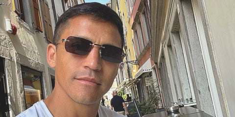 Chilean footballer Alexis Sanchez of the Sevilla FC was seen wearing gold Cartier CT0498S 005 sunglasses with brown lenses in his Instagram post, August 2025.