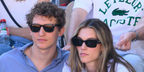 Aliocha Schneider , pictured with Charlotte Cardin, was seen wearing the iconic Ray-Ban Wayfarer 2140 901 Black sunglasses at the 2024 French Open