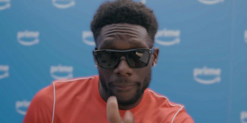 Canadian footballer Alphonso Davies was seen wearing black Tom Ford Alberto TF1077-N 01D Polarised sunglasses at the Amazon x Alphonso Davies pop-up in Toronto in June 2026.