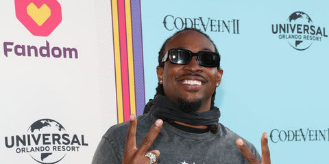 Former American football wide receiver Alshon Jefferey was seen wearing black Prada PR 27ZS 16K08Z sunglasses at the Fandom Party during Comic Con 2025 in San Diego. Shop online now on Pretavoir