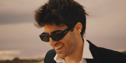 Spanish singer Alvaro de Luna was seen wearing black Saint Laurent Sun SL 329 001 sunglasses in his 2024 music video F.G.L.C. (A Ratitos). Shop online now on Pretavoir