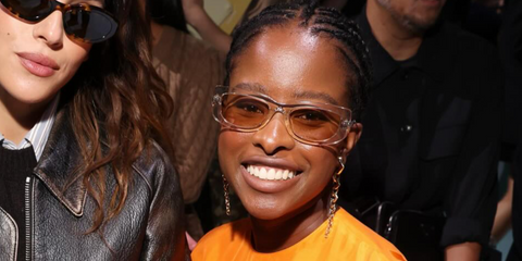 Poet and activist Amanda Gorman was seen wearing transparent beige Prada PR 14YS 19M4I2 sunglasses at the Prada Spring/Summer 2025 fashion show during Milan Fashion Week. Shop online now on Pretavoir