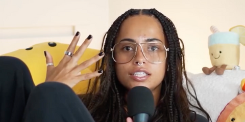 Television personality Amber Gill of Love Island was seen wearinggold Miu Miu MU A56S 5AK08N Blue Control optical glasses in her Instagram reel, October 2025.