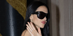 Amelia Gray Hamlin was seen wearing black Gucci GG2168S 006 sunglasses during Milan Fashion Week Fall/Winter 2026 season.