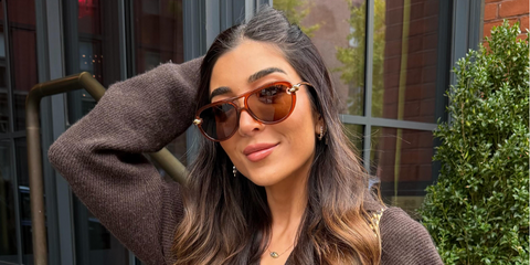 Creator Amelia Liana was seen wearing transparent brown Bottega Veneta BV1418S 004 Knot sunglasses in her Instagram reel, December 2025.
