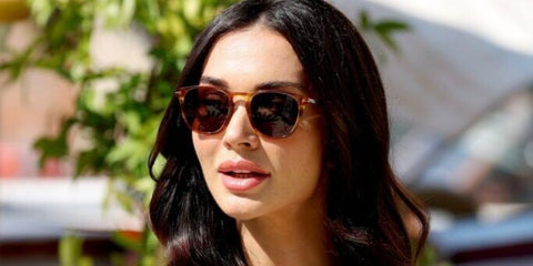 Amy Jackson was seen wearing transparent brown David Beckham DB 1160/S EX470 sunglasses with brown lenses to attend the 2024 Venice Film Festival