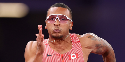 Canadian sprinter Andre De Grasse was seen wearing white Oakley Stunt Devil OO9517 07 sunglasses with  Prizm pink lenses at the World Athletics Championships Tokyo 2025. Shop online now on Pretavoir