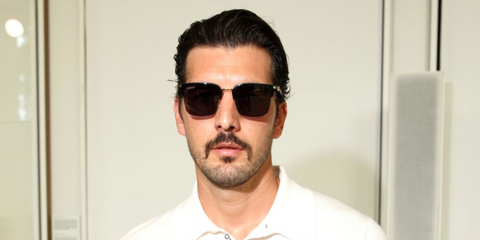 Danish-Italian actor, and husband of Venus Williams, Andrea Preti was seen wearing black and gold Gucci GG1226S 001 half-rim sunglasses at the Gucci Menswear Spring/Summer 2025 fashion show during Milan Men's Fashion Week.