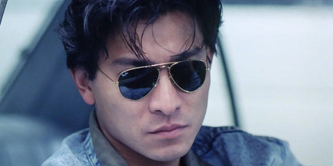 Hong Kong actor Andy Lau was seen wearing Ray-Ban Aviator 3025 L0205 Gold/G15 Green sunglasses in 1990 movie "A Moment of Romance". Shop online now on Pretavoir