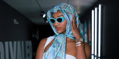 Angel Reese was seen wearing light blue Pucci EP0216/S 84V sunglasses in her Instagram post