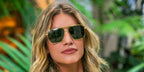 Model and influencer Angie Landaburu was seen wearing gold Bottega Veneta BV1012S 004 aviator sunglasses with green lenses.