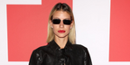 Model and influencer Angie Landaburu was seen wearing gold Gucci GG1221S 001 sunglasses with grey lenses at the Diesel Fall/Winter 2023 fashion show during Milan Fashion Week.