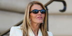 Anna Dello Russo was seen wearing black Saint Laurent Sun SL 567 001 sunglasses at the Schiaparelli Haute Couture Fall/Winter 2026 fashion show during Paris Couture Week.