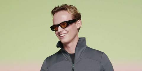 Anson Boon was seen wearing black Prada PR B19S 16K455 sunglasses with yellow lenses at the Prada Spring/Summer 2026 fashion show during Milan Fashion Week