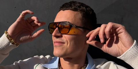 Spanish actor Aron Piper was seen wearing dark tortoisesell Tiffany & Co TF4264U 8015/85 sunglasses with yellow lenses in his Instagram post, April 2026.