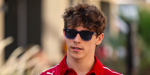 Arthur Leclerc was seen wearing blue Ray-Ban Wayfarer Reverse RB R0502S 6708/3A sunglasses at the F1 Grand Prix of Abu Dhabi 2025.