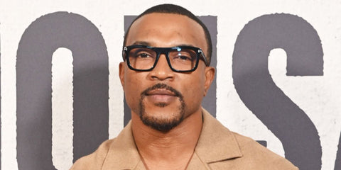 Rapper and actor Ashley Walters was seen wearing black Tom Ford TF5757-B 001 Blue Control optical glasses at the Gala screening of "A Thousand Blows" during the 68th BFI London Film Festival, October 2024.