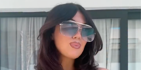 Television personality Belle Hassan of Love Island was seen wearing Dita Mach Six - Inovati DTS 121 01 with Real White Diamonds sunglasses in her Instagram reel, October 2025.