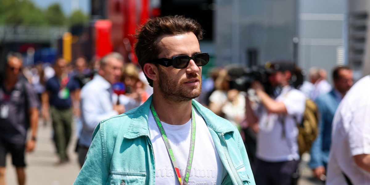 Footballer Ben Chilwell of Chelsea FC was seen wearing black Prada PR 17WS 1AB5S0 Symbole Sunglasses at the F1 Grand Prix of Spain 2025. Shop online now on Pretavoir