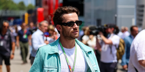 Footballer Ben Chilwell of Chelsea FC was seen wearing black Prada PR 17WS 1AB5S0 Symbole Sunglasses at the F1 Grand Prix of Spain 2025. Shop online now on Pretavoir