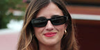 Italian actress Benedetta Porcaroli was seen wearing black Prada PR B06S 16K08Z sunglasses at the Venice Film Festival 2025. Shop online now on Pretavoir