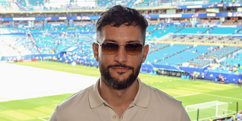 Argentinian music producer Big One was seen wearing gold Ray-Ban RB 3746 001/51 sunglasses with brown gradient lenses at the FIFA World Cup 2026.