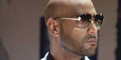 French rapper Elie Yaffa also known as Booba was seen wearing gold Dita Talon 23007 A sunglasses 