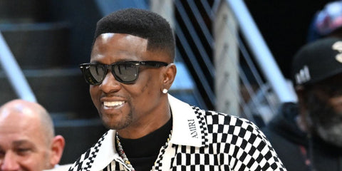 Rapper Boosie Badazz was seen wearing the iconic Ray-Ban Wayfarer 2140 901/58 Polarised sunglasses at the game between the Indiana Pacers and the Atlanta Hawks in Atlanta, Georgia, in March 2025.