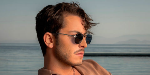 Turkish actor Boran Kuzum was seen wearing silver Cartier CT0459S 003 sunglasses with blue lenses.