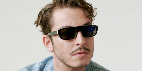 Turkish actor Boran Kuzum was seen wearing black Gucci GG1617S 001 sunglasses at the Gucci Menswear Spring/Summer 2025 fashion show during Milan Men's Fashion Week.