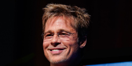 Brad Pitt wears Silhouette glasses as he speaks on stage at the Outstanding Performer of the Year Award ceremony during the 39th Annual Santa Barbara International Film Festival at The Arlington Theatre on the 8th of Feb 2024