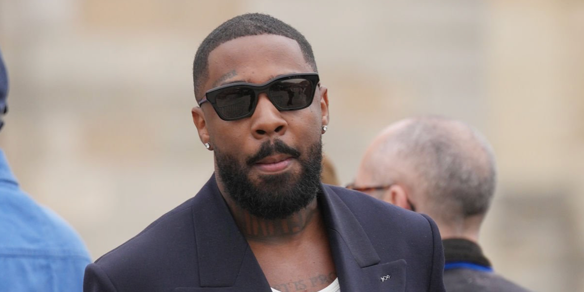 Brent Faiyaz was seen wearing black Loewe Slim LW40177I 01A sunglasses at the Loewe Fall/Winter 2026 fashion show during Paris Fashion Week.