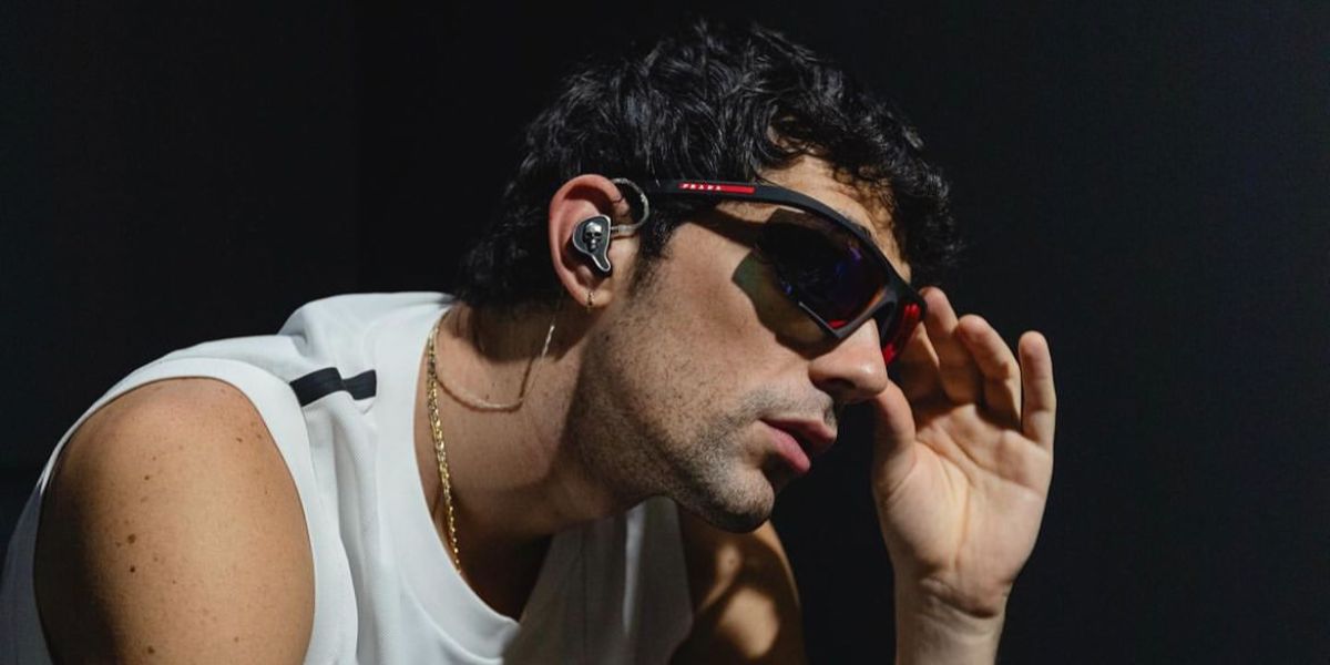 Italian rapper Bresh was seen wearing black Prada Linea Rossa SPS 07Y DG010A sunglasses in a collaborative editorial, September 2023.